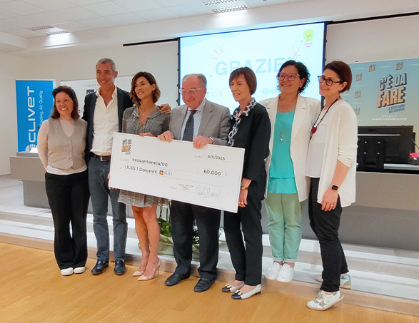 Delivery by Clivet and C'è Da Fare of the check to ULSS1 Dolomiti for the Safe Teen project with Paolo Kessisoglu